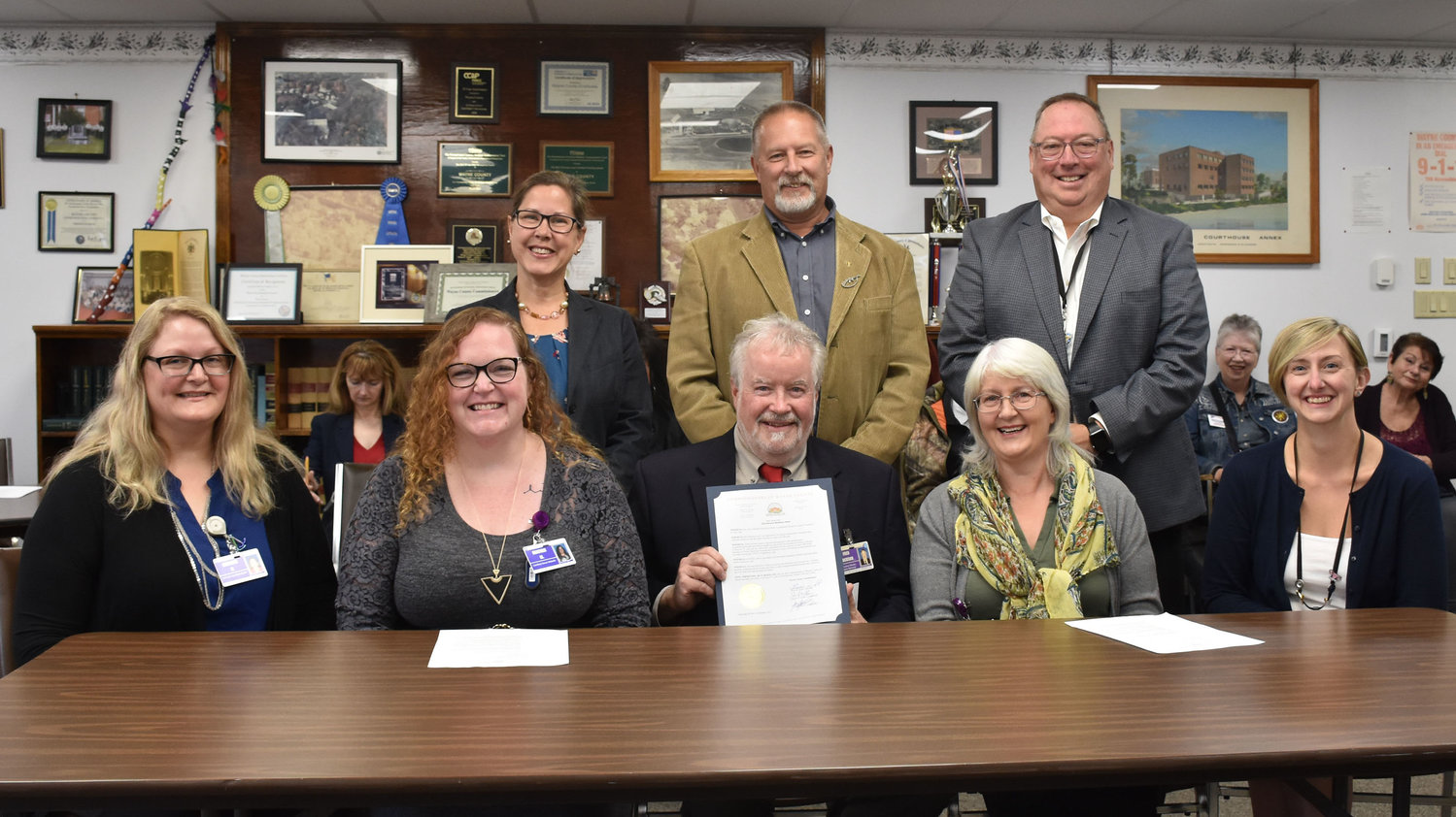 The Wayne County commissioners named the week of October 2 Midwifery Week. Pictured, in front, are: Heather Kellam, left; Heather Mecone; Frederick Jackson; Pat Konzman; and Kara Poremba. In back row are pictured Jocelyn Cramer, left; Brian Smith and Joe Adams.